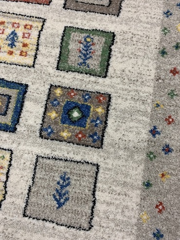 Infinity nukkamatto beige-värikäs