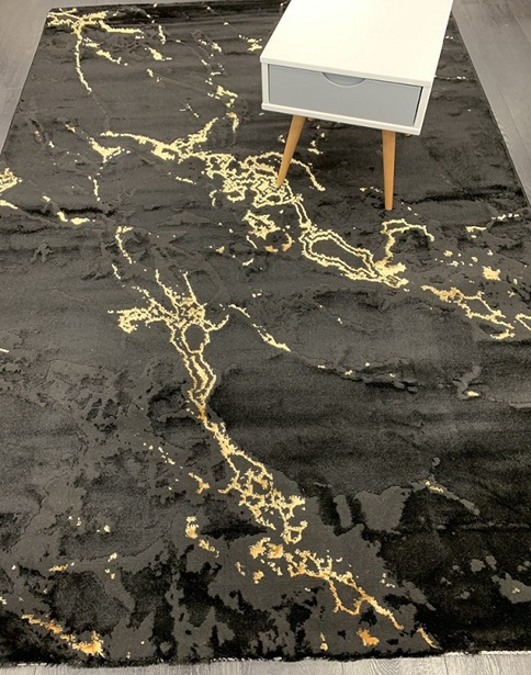 Stone nukkamatto musta-kulta marmori