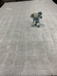 Feliz nukkamatto luonnonvaalea